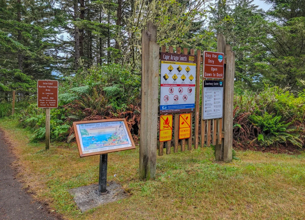Trailhead signs at Cape Arago South Cove, including the intertidal Marine Protected Area notice