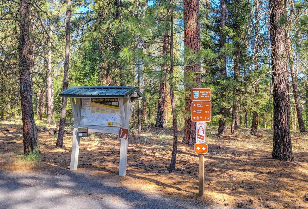 TJ Meenach Bridge trailhead sign on the Spokane River Centennial Trail