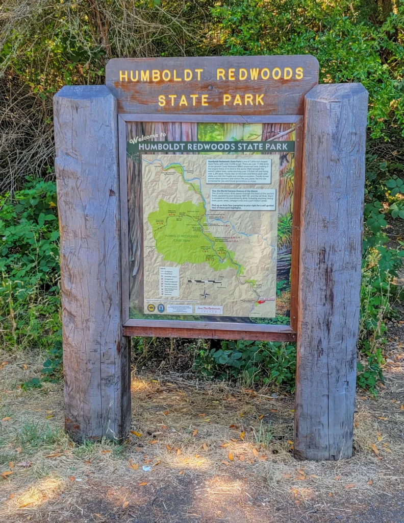 Humboldt Redwoods State Park entrance sign with park map at the southern end of the Avenue of the Giants