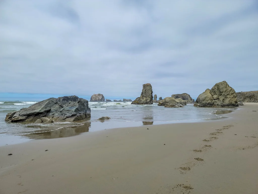 Sea stacks receding along the shoreline at Bandon Beach