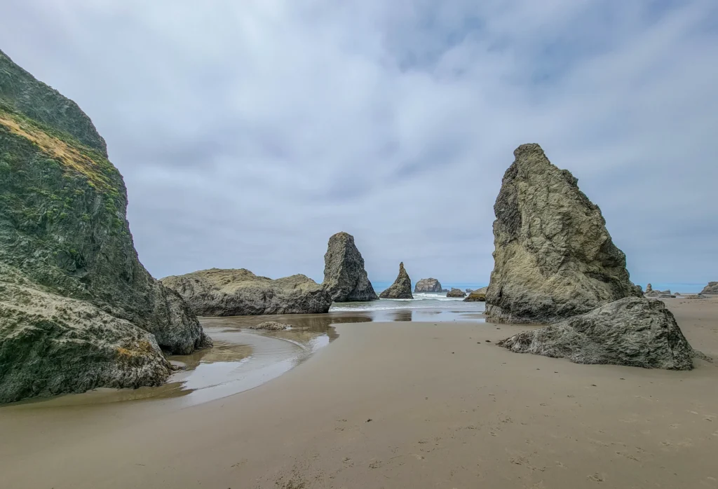 Sea stacks close in along the shoreline at Bandon Beach