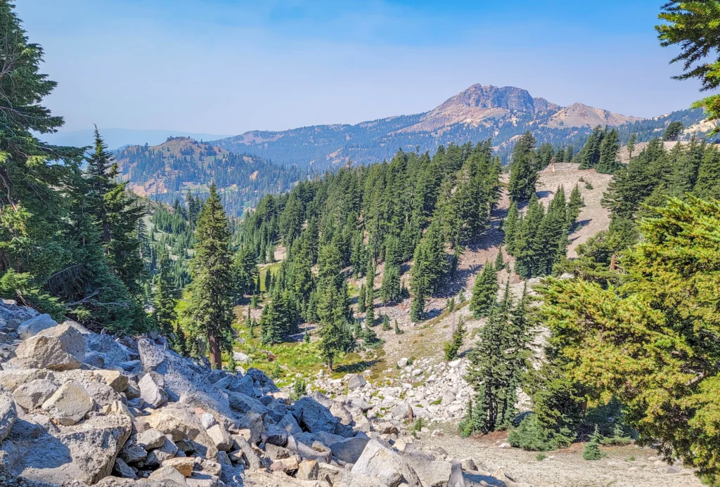 Volcanic peaks and rocky slopes seen from the first mile of the Bumpass Hell Trail