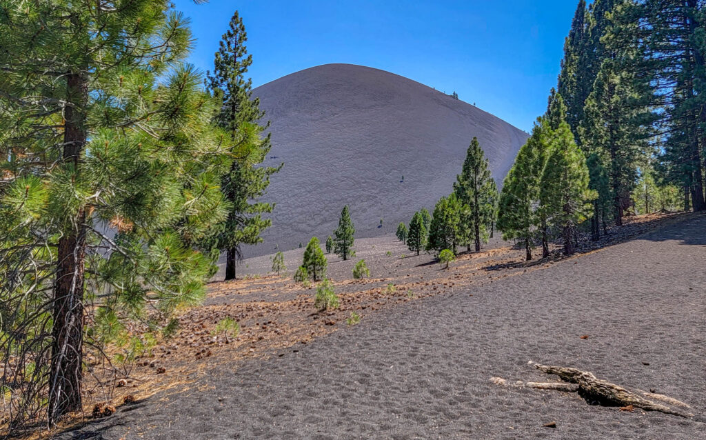 Cinder Cone volcano rising above the lava plain in Lassen Volcanic National Park
