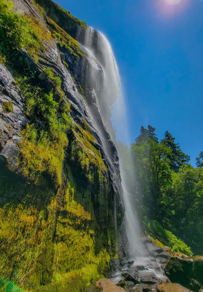 Silver Falls seen from the base looking up the cliff